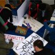 people make signs with markers