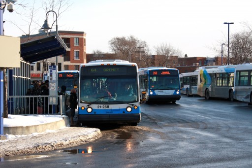 STM busses at Côte-Vertu metro, a major transporation hub in the Norman-McLaren district